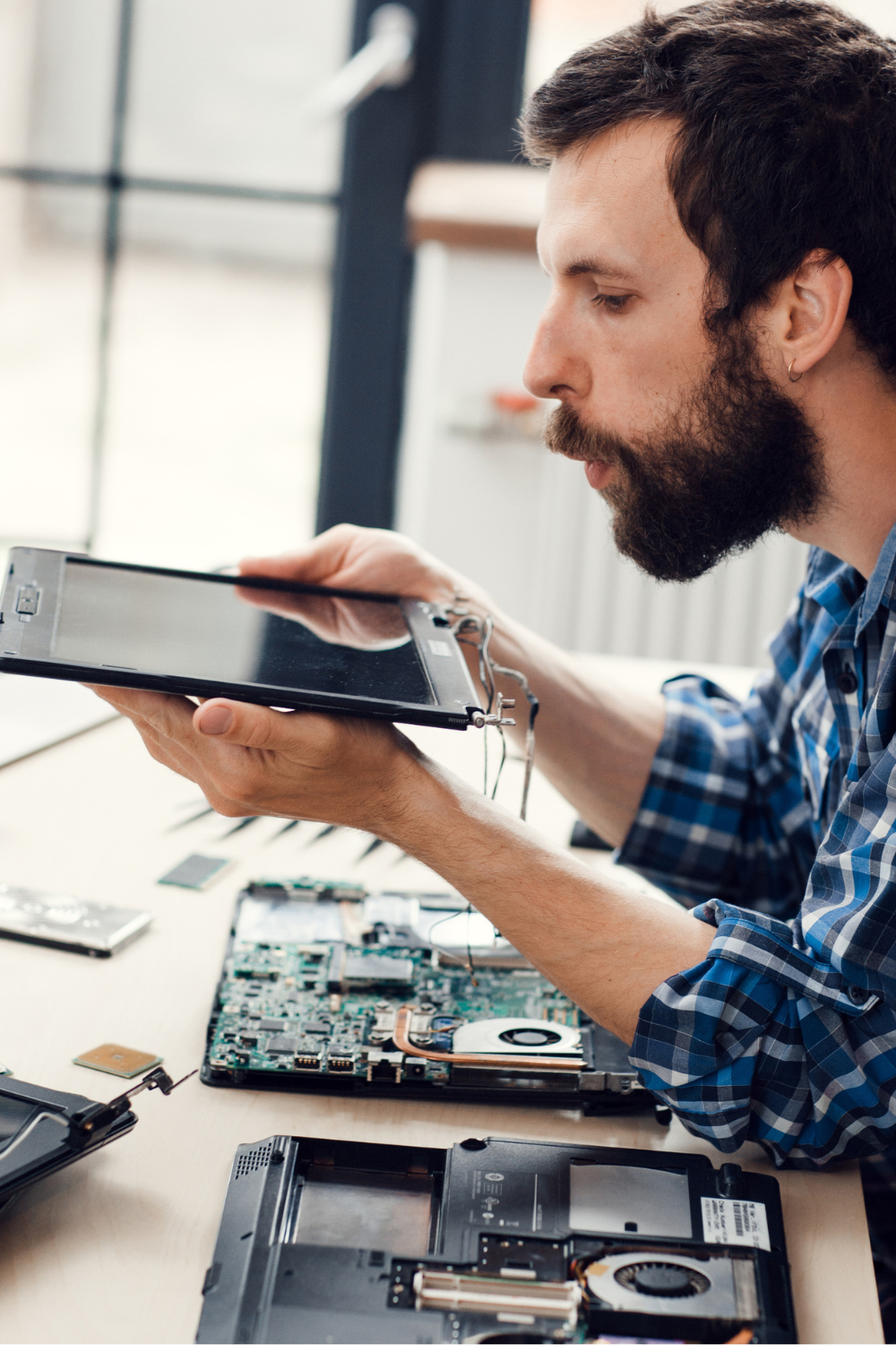 Man Repairing Laptop screen
